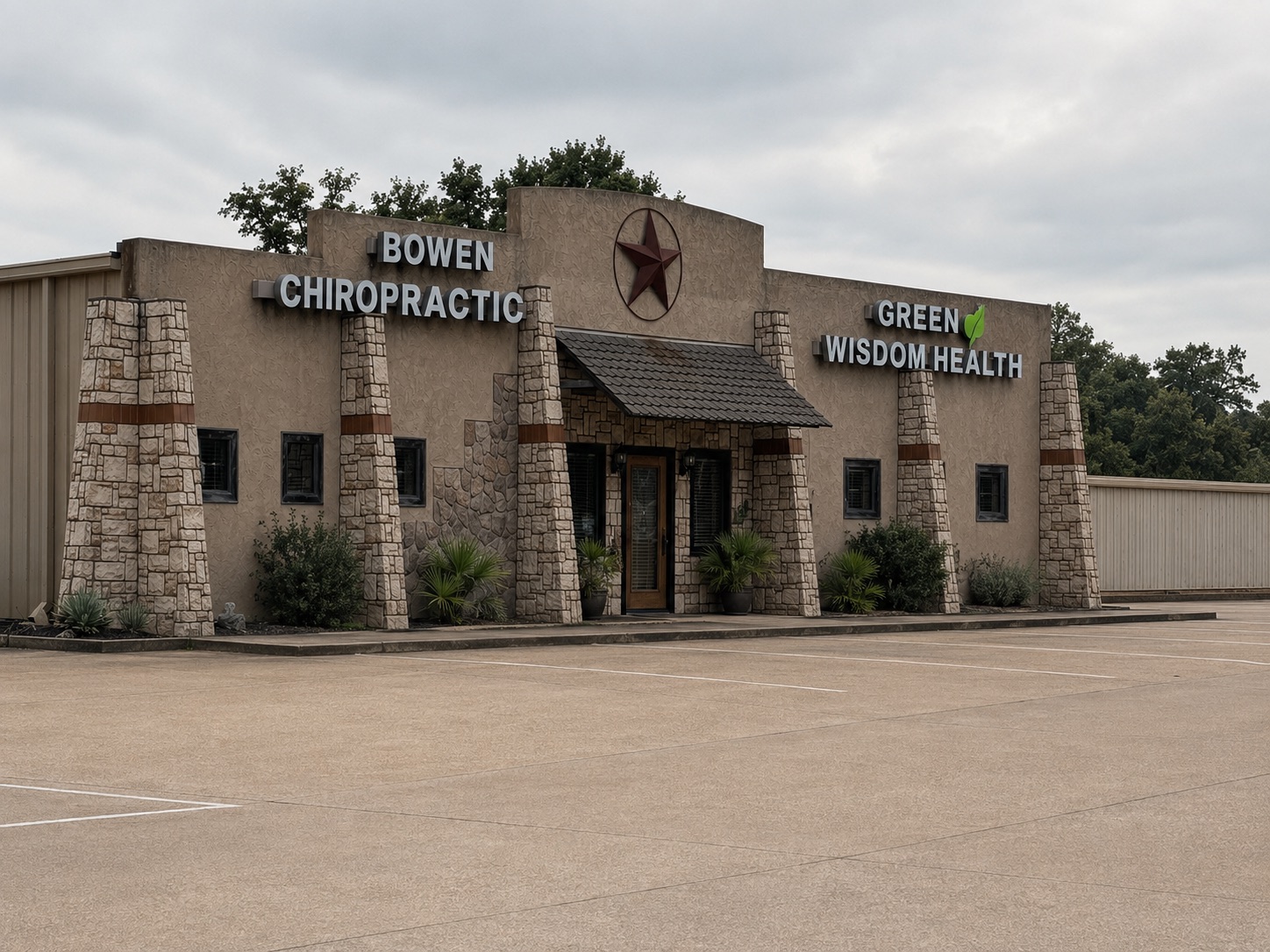 Green Wisdom Health signage at the shared Bowen Chiropractic office building